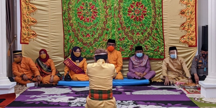 Pelaksanaan mopotilolo Pejabat Sementara (Pjs) Bupati Bone Bolango, Moh. Nadjamuddin, Senin (28/9/2020)
