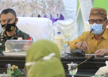 Syarif Mbuinga bersama Dandim 1313/Pohuwato Letkol Czi Purbo Awin Niarto, S.Si. MM,