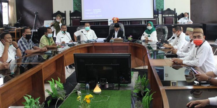 a Rapat persiapan pemilihan kepala desa kabupaten Gorontalo serentak tahun 2021.(Putra/Gopos).