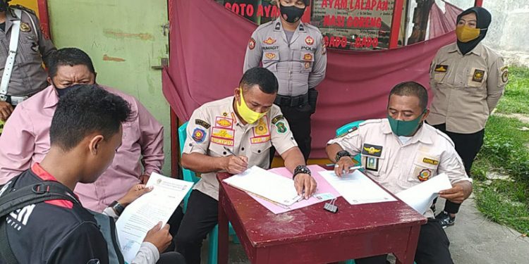 Teguran tertulis bagi pelanggar protokol kesehatan