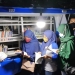 PERPUSTAKAAN KELILING - Beberapa pelajar sedang menikmati bacaan buku di Perpustakaan Keliling Kota Gorontalo. Rabu (20/1/2021). (Foto Istimewa)