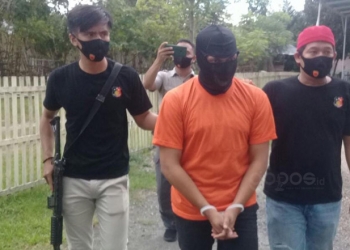 Tersangka jambret handphone