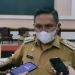 TELUK TOMINI - Walikota Gorontalo, Marten Taha saat diwawancarai oleh sejumlah wartawan usai menghadiri Dialog Akhir Tahun 2021 di Bandayo Lo Yiladia, Senin (18/1/2021). (Ari/Gopos)
