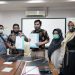 GENJOT PRODUKTIFITAS - Penandatanganan kerja sama antara BPU Universitas Negeri Gorontalo dengan Kepala Desa Tamaila Utara dalam rangka pendampingan untuk memproduksi dan memasarkan produk VCO BUMDes Tamaila Utara (Istimewa)