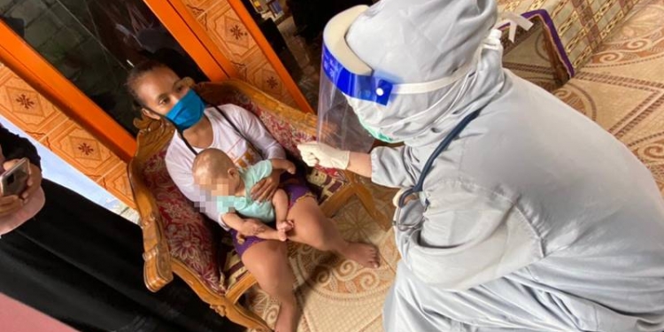 Anak Bayi diberi miras