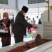Wakil Ketua DPRD Provinsi Gorontalo, Kris Wartabone saat menziarahi kubur Pahlawan Gorontalo, Nani Wartabone. Foto: Istimewa.