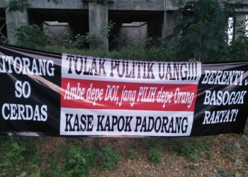 Spanduk tolak politik uang (foto: istimewa)