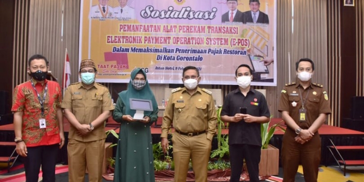 Sosialisasi pemanfaatan alat perekam transaksi elektronik payment operation system (E-POS). Foto: Istimewa.