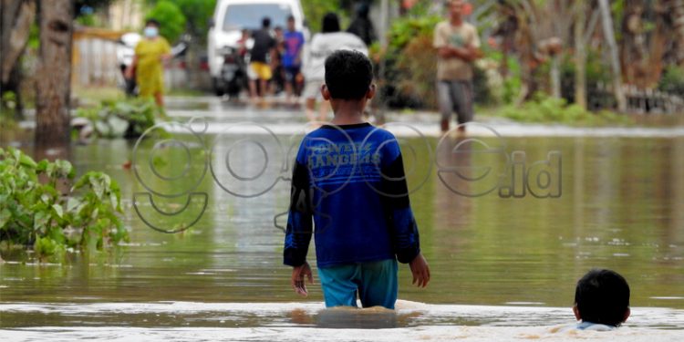 FOTO: Banjir yang Terjadi di Kecamatan Tomilito Banjir