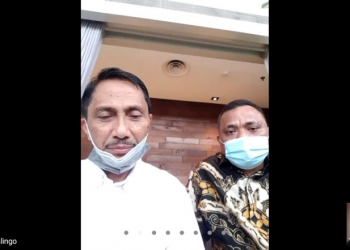 Tangkapan Layar - Pasangan Calon Bupati Nelson Pomalingo dan Calon Wakil Bupati Hendra S Hemeto, Saat melakukan vidcon bersama media. (Putra/Gopos)