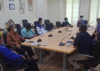 DISTRIBUSI BANTUAN - Rapat persiapan distribusi bantuan untuk korban banjir Manado yang dilaksanakan oleh Pemkab Bone Bolango, Rabu (3/2/2021). (Indra/gopos)