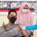 VAKSINASI COVID - Kapolres Gorontalo Kota, AKBP Desmont Harjendro AP, menjalani vaksinasi covid-19. (Humas Polres Gorontalo Kota)