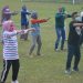 Wakil Bupati Bone Bolango Merlan S. Uloli saat melakukan senam aerobik bersama OPD terkait usai melakukan peletakkan batu pertama pembanguna tribun di Lapangan Likada Kabila. (Foto AKP/Kominfo)
