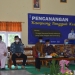 Wakil Bupati Bone Bolango saat memberikan sambutan sekaligus mencanangkan Kampung Tangguh Kesehatab di Desa Tulabolo Kecamatan Suwawa Timur (foto AKP/Kominfo)