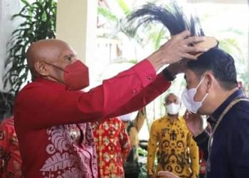 Penyambutan Adat oleh Pemerintah Kota Jayapura bagi Rombongan Pemerintah Kabupaten Bone Bolango.