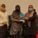 Ketua Jurusan Bahasa Inggris UNG, Novi Rusnarty Usu, S.Pd., M.A,  saat menyerahkan Prosiding ke Dekan Fakultas Sastra dan Budaya UNG, Prof. Dra. Nonny Basalamah, M.A., Ph.D
