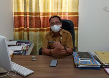 Sekretaris Dinas Kesehatan Bone Bolango Ridwan B. Maruf saat diwawancarai oleh di Kantor Dinas Kesehatan Bone Bolango (Indra/Gopos)