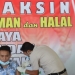 VAKSINASI - Petugas Bid Dokkes Polda Gorontalo saat melakukan Vaksinasi. Foto istimewa