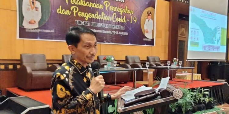 Bupati Gorontalo, Nelson Pomalingo saat membuka kegiatan rapat koordinasi pelaksanaan pencegahan dan pengendalian covid -19, di Swiss-Belhotel Manado, Senin (14/6/2021). Istimewa