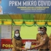 Wakil Bupati Bone Bolango Merlan S. Uloli bersama Satgas Covid-19 saat melakukan monitoring Posko PPKM Mikro di Desa Tanggilingo Kecamatan Kabila. (foto Irul/Kominfo)