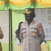 Wakapolres Bone Bolango Kompol Sudarsih bersama Wakil Bupati Bone Bolango Merlan S. Uloli dan Pemerintah Desa Tanggilingo saat mengedukasi masyarakat pentingnya penerapan protokol kesehatan (foto Onal/Prokopim)