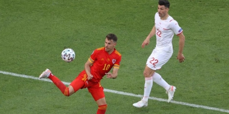 Pertandingan antara Timnas Wales Versus Timnas  Swiss yang berakhir imbang 1-1 (foto : situs resmi UEFA)