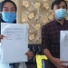 Ketua Komisi Pemilihan Umum (KPU) Bone Bolango, Adnan Berahim bersama Kepala SMAN Suwawa menandatangani kerja sama PDPB, Rabu (9/6/2021) (isitmewa)