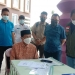 Bupati Gorontalo, Nelson Pomalingo Bersama Kepala Dinas Kesehatan Kabupaten Gorontalo, Roni Sampir saat mengunjungi Mess Haji Kota Gorontalo untuk menjenguk pasien terinfeksi virus Covid-19. (Istimewa)