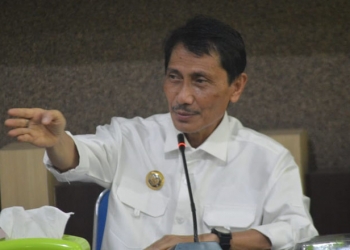 Bupati Gorontalo, Nelson Pomalingo, saat memberikan arahan di Pertemuan Evaluasi Target dan Realisasi Penyerapan KUR pertanian,  di aula kantor Dinas Pertanian Kabupaten Gorontalo, Rabu (14/7/2021). Foto : Putra/Gopos.