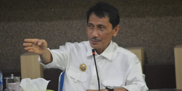 Bupati Gorontalo, Nelson Pomalingo, saat memberikan arahan di Pertemuan Evaluasi Target dan Realisasi Penyerapan KUR pertanian,  di aula kantor Dinas Pertanian Kabupaten Gorontalo, Rabu (14/7/2021). Foto : Putra/Gopos.
