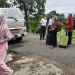 Para santri Ponpes Hubulo bersiap menuju ke lokasi karantina terpusat di Asrama Haji Provinsi Gorontalo, Sabtu (17/7/2021). (istimewa)