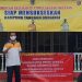 Pemasangan baliho di kawasan zona merah oleh Polsek Dungingi,