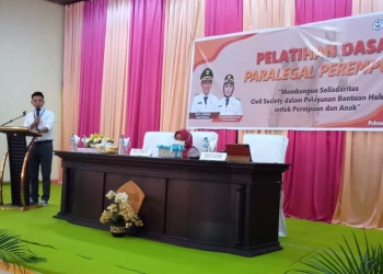 Ketua Wahana Keadilan LBH Pohuwato, Stenly Nipi, bersama Asisten II Perekonomian, Rusmiati Pakaya. (Foto istimewa)