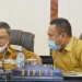 Sekda Gorut, Ridwan Yasin saat bersama Bupati Gorut, Indra Yasin di salah satu kegiatan. (foto.istimewa)