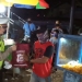 Pembagian sembako bagi pedagang yang ada di seputaran objek wisata Pohon Cinta, Marisa, Pohuwato. (mahmud/gopos)