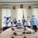 Bupati Bone Bolango, Hamim Pou didampingi Plt Asisten I Setda Bone Bolang, Jusni Bolilio beserta jajaran pemerintah lainnya saat foto bersama setelah meraih penghargaan TPID Award Terbaik se-Sulawesi kategori Kabupaten Berprestasi Tahun 2021. (Foto Istimewa)