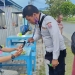 Dinas Perhubungan saat melayani masyarakat dalam pengunaan QRIS pada retribusi parkir. (Foto Istimewa)