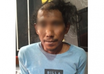 PENCURIAN HANDPHONE - NA pemuda Asal Desa Tupa Kecamatan Bulango Utara Kabupaten Bone Bolango saat diamankan oleh pihak Satreskrim Polres Gorontalo. Istimewa