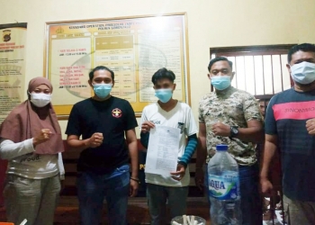 AG alias Adrian (tengah) diamankan Sat ReskrimPolres Gorontalo setelah diduga mencoba memperkosa seorang gadis.