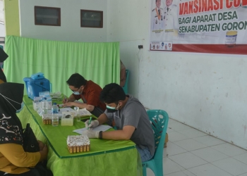 VAKSINASI APARAT DESA - Suasana pelaksanaan vaksinasi aparat desa di Lapangan Sport Center Limboto, Kabupaten Gorontalo, Kamis (12/8/2021), Foto : Putra/Gopos.