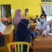 Kegiatan vaksinasi covid-19 yang berlangsung di halaman DPD II Golkar Pohuwato, Selasa (24/8/2021). (mahmud/gopos)