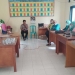 Suasana pendampingan penginputan data vaksinasi dari Diskominfotik Provinsi Gorontalo kepada operator desa yang berada di Kecamatan Tilango, di kantor Camat Tilango, Kamis (26/8/21). (Foto: Mila)