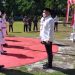 Proses pengukuhan delapan anggota Paskibraka Bone Bolango yang dilaksanakan dengan protokol kesehatan dan di tempat terbuka. (Foto Indra/Gopos)