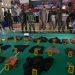 Polisi memperlihatkan sejumlah barang bukti hasil kontak tembak antara Satgas Madago Raya dengan kelompok teroris MIT Poso, di Mapolres Parigi Moutong, Kabupaten Parigi Moutong, Sulawesi Tengah, Minggu (19/9/2021).