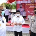 Gubernur Rusli dan Forkopimda Gorontalo saat meninjau pelaksanaan gerai vaksinasi massal di lapangan Taruna Remaja Kota Gorontalo, Rabu (8/9/2021). Vaksinasi massal ini dilaksanakan oleh Polda Gorontalo. (Foto – Salman)