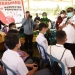 Gubernur Gorontalo, Rusli Habibie, memberi motivasi kepada siswa pada pelaksanaan vaksinasi massal di wilayah Kabupaten Pohuwato. (dok. Kominfo Prov. Gorontalo)