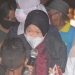 Kementerian Sosial, Tri Rismaharini saat meninjau lokasi banjir dan memberikan sembako di dua tempat berbeda, yakni di Kelurahan Kayubulan, Kecamatan Limboto dan Desa Buhu, Kecamatan Telaga Jaya, Kabupaten Gorontalo, Rabu (29/9/2021). (Foto: Putra/Gopos)
