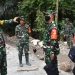 Tim Wasev Mabes TNI AD yang dipimpin oleh Pa Sahli TK. II Kasad Bidang Sosbud Brigjen TNI R. L. Simanjuntak bersama Kaurminpers Tuud Seterad Kapten Inf Ujang Suryadi didampingi Dandim 1304/Gorontalo Letkol Czi Donny Ardiwidha dan Plt. Camat Pinogu Iwan Hadju melakukan peninjauan pembangunan jalan rabat beton dan drainase yang dikerjakan oleh Satgas TMMD ke-112 Kodim 1304/Gorontalo di Desa Tulabolo Timur. (Foto Istimewa)