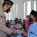 Kapolres Tulungagung saat memberikan sambutan kepada anak yatim. (Foto: dok. Polres Tulungagung)