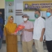 DUGAAN MALAPRAKTIK - Pihak keluarga korban pasien dugaan malapraktik di RS Multazam Gorontalo saat memberikan aduan ke Pihak Dinas Kesehatan Provinsi Gorontalo, Aula Kantor Dinas Kesehatan Provinsi Gorontalo, Senin (18/10/2021). Foto : Putra/Gopos).